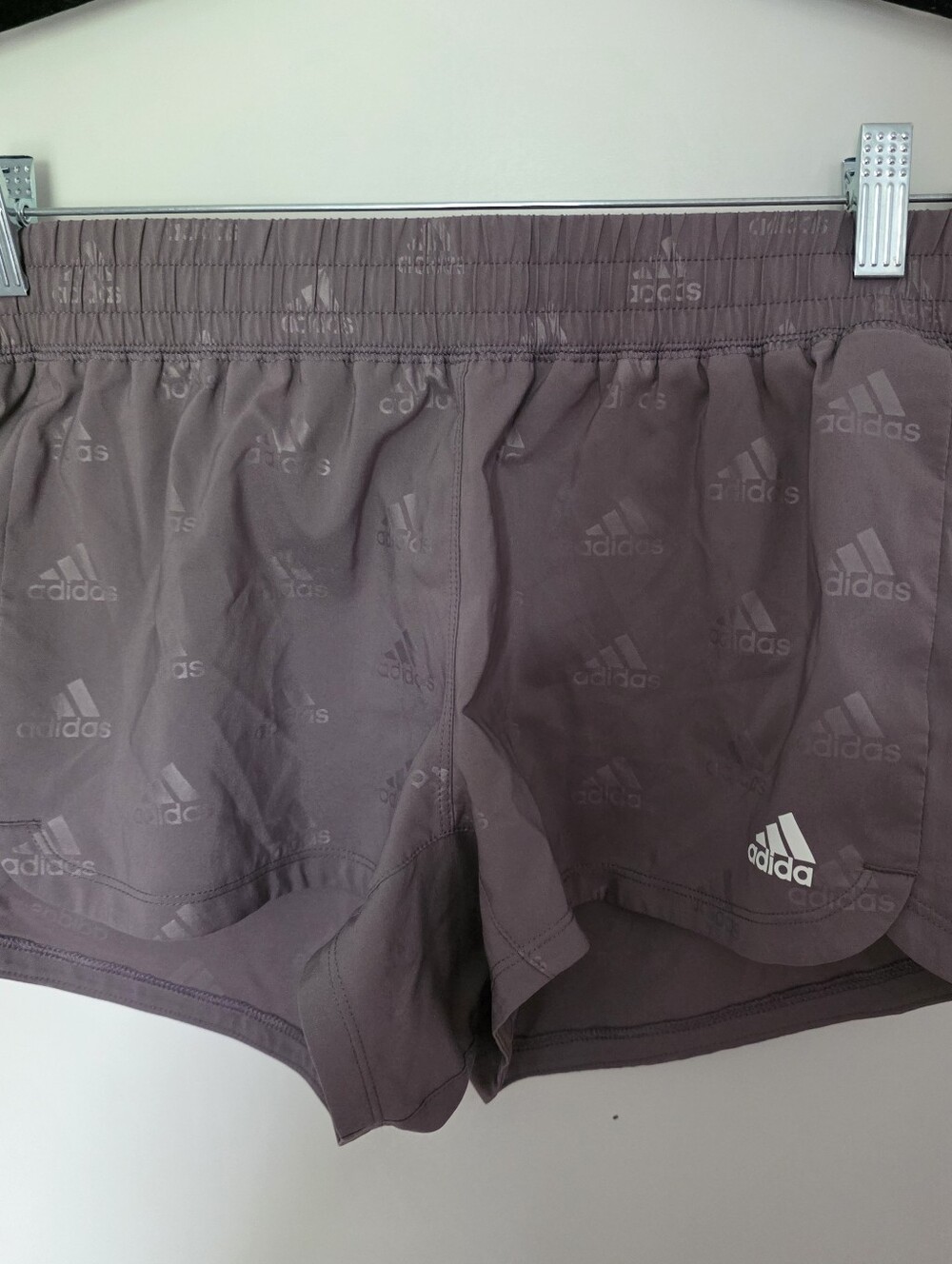 Adidas Womens Pacer shorts debossed logo pattern and a mauve color Size S